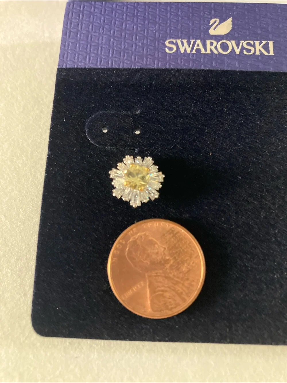 Swarovski crystal sunshine pierced earrings in rhodium plating